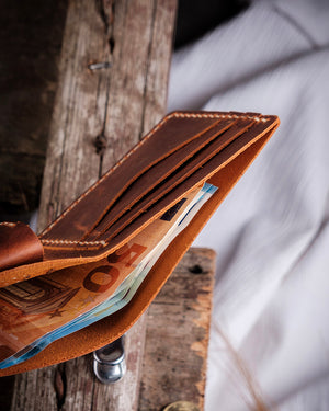Dogaart Rio name engraved camel crazy leather wallet banknote compartment showing interior organization layout
