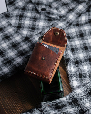 Dogaart Athen brown waxed pull up leather card holder open showing multiple cards fitted in slots