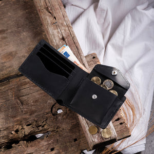 Dogaart Rio handcrafted black crazy leather wallet interior compartment view showing spacious design