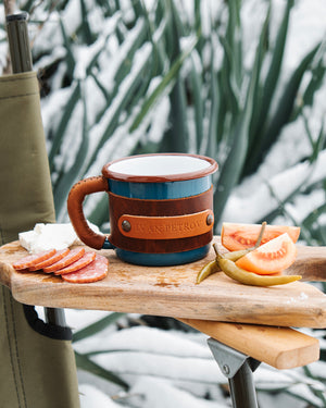 Rustic hiking mug with leather wrap perfect for outdoor adventures and camping trips, outdoor front view